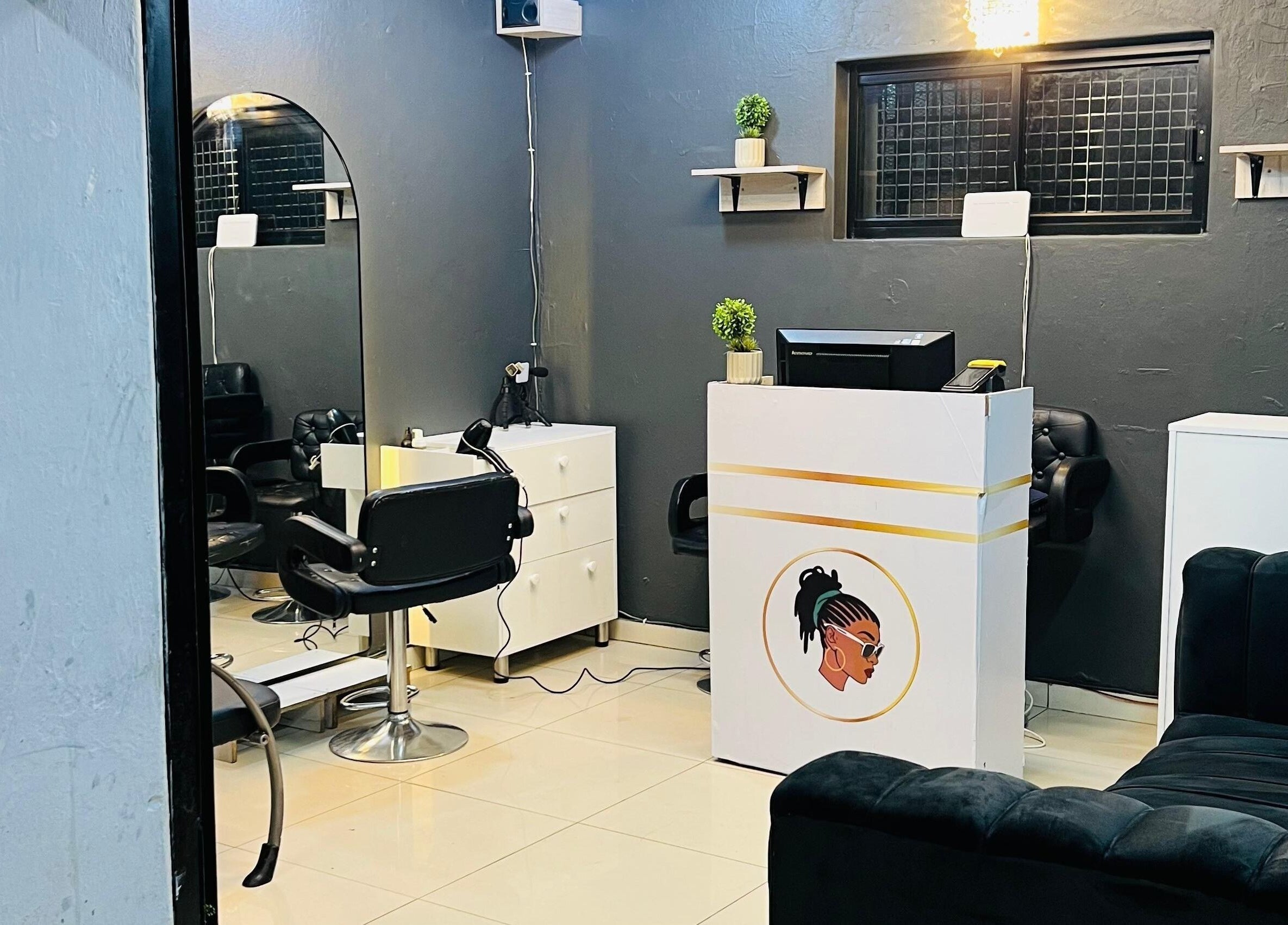 Modern interior of Loctician Carlocs Studio - Johannesburg, featuring sleek furnishings, located in Johannesburg, Gauteng, ZA.