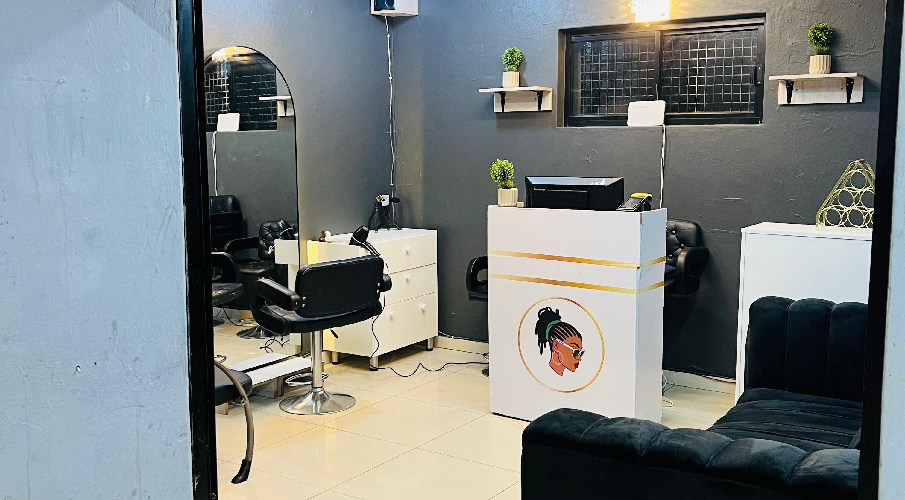 Modern interior of Loctician Carlocs Studio - Johannesburg, featuring sleek furnishings, located in Johannesburg, Gauteng, ZA.