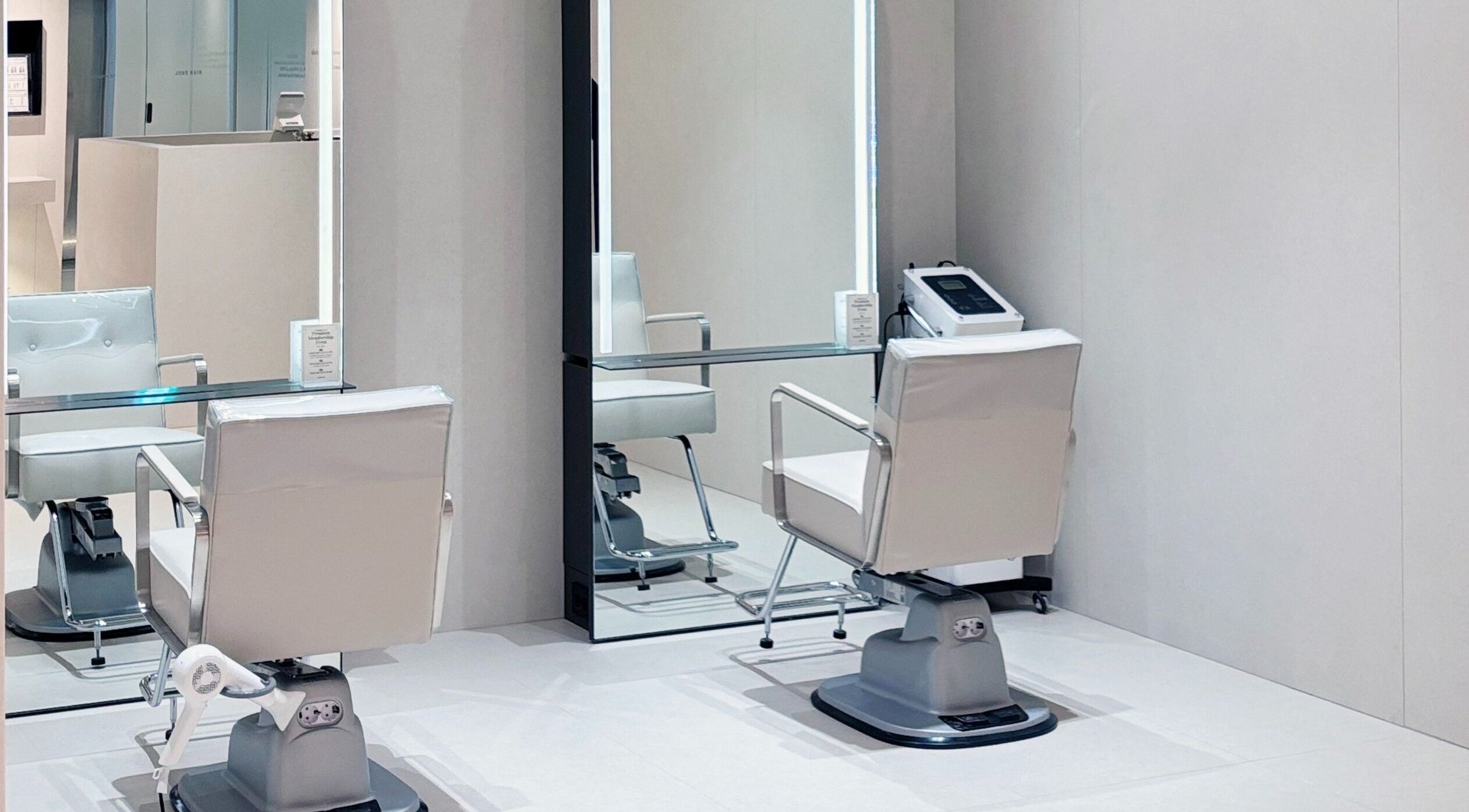 Modern salon chair at Juno Hair Myeongdong Art Theater Branch in Seoul, South Korea.