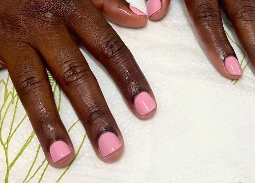 Manicured pink nails at Jessie Beauty, Cape Town, Western Cape, ZA, showcasing elegance and style.