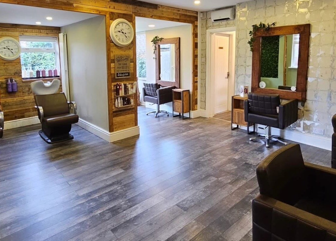 Chic salon interior with rustic wooden accents at Created By Con, Blackpool, England, GB.