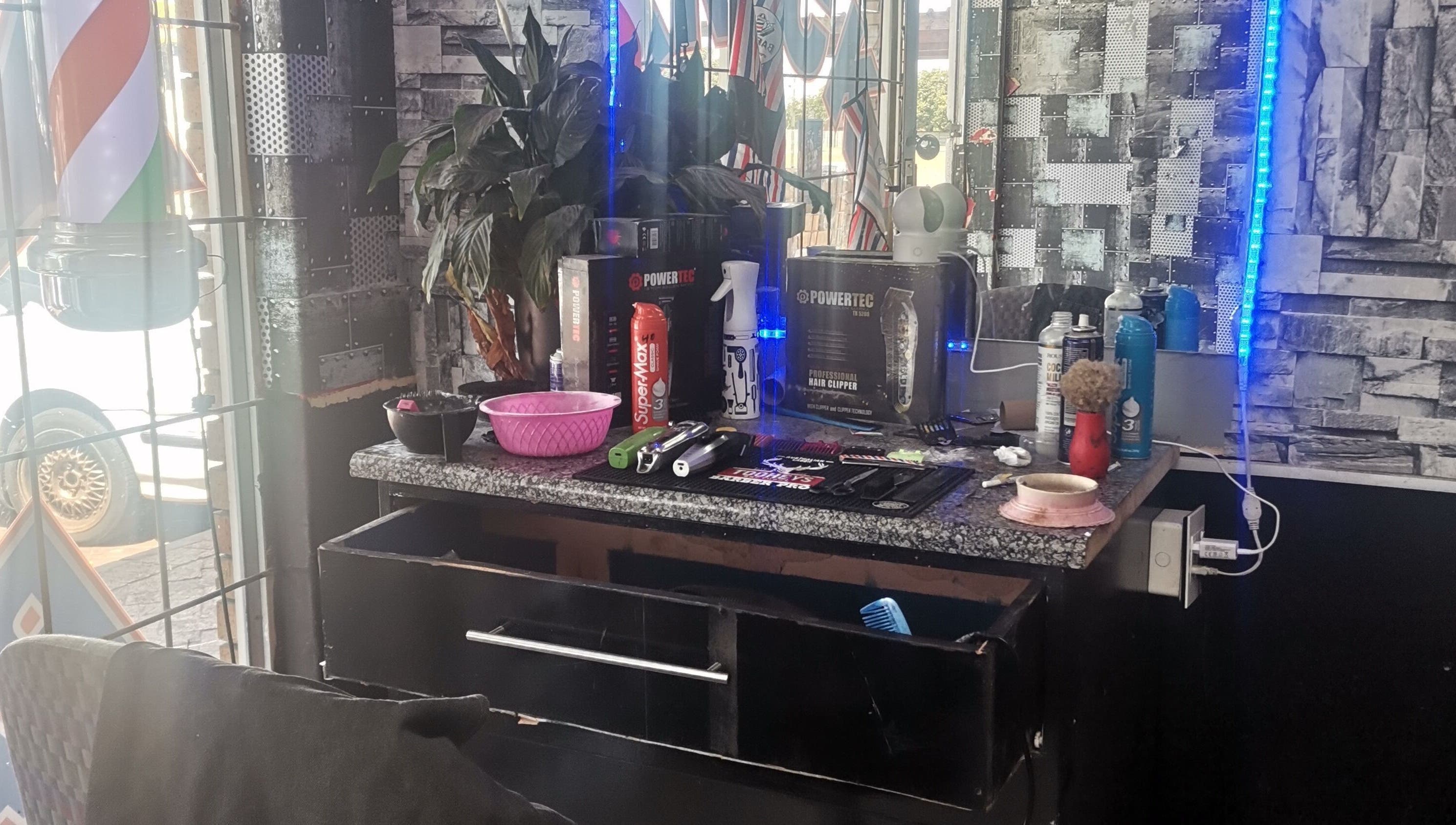 Barber station at C's_Cuts in Cape Town, Western Cape, ZA with grooming tools and products.