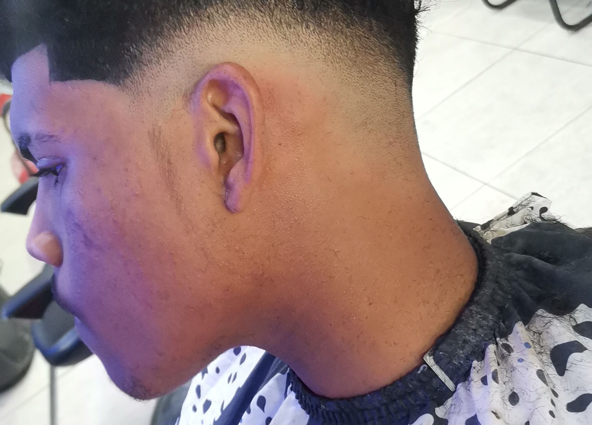 Close-up of a stylish fade haircut at C's_Cuts in Cape Town, Western Cape, ZA.