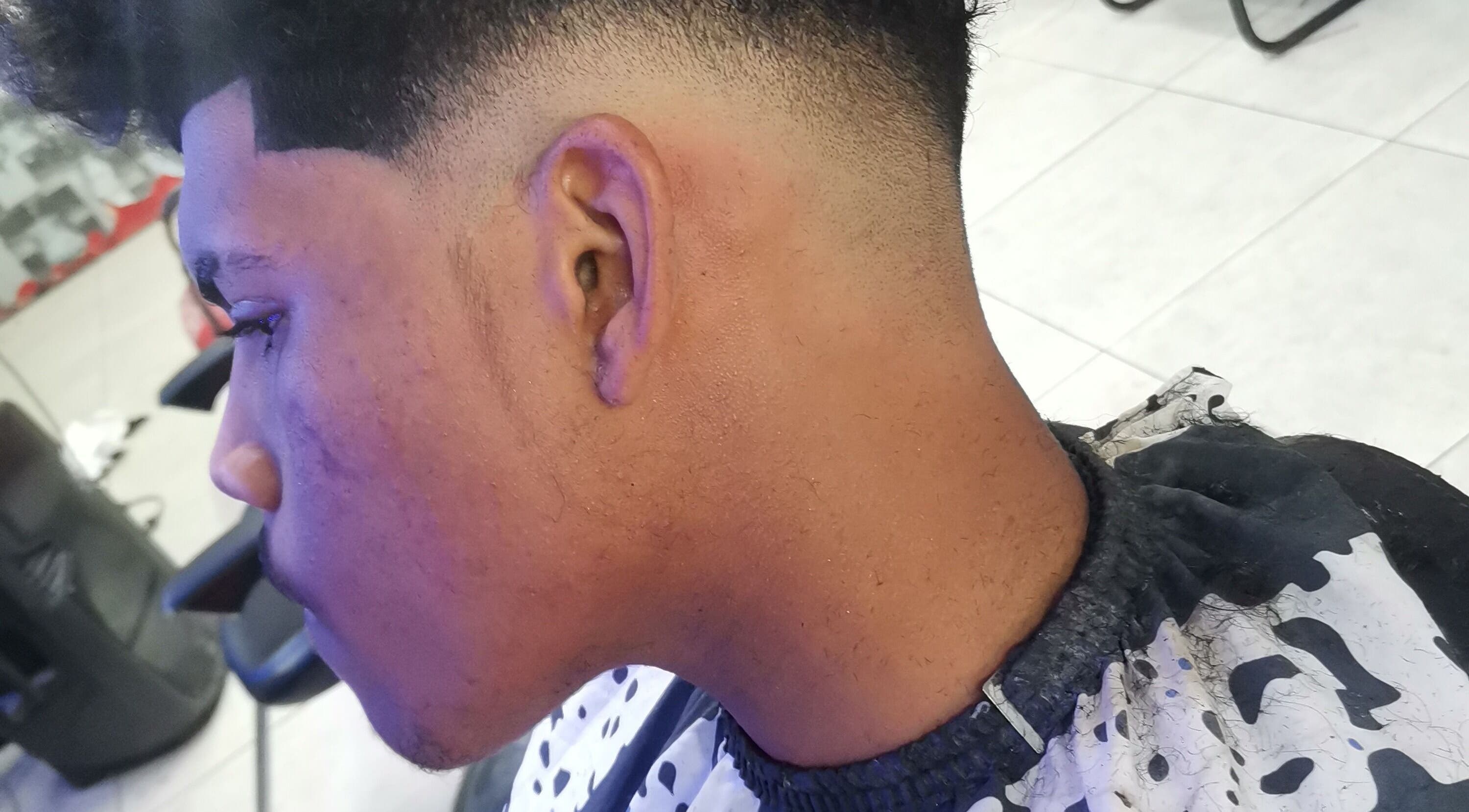Close-up of a stylish fade haircut at C's_Cuts in Cape Town, Western Cape, ZA.