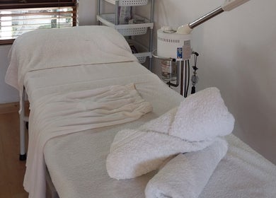 Spa treatment room at TWO'S COMPANY Hair & Beauty in Sandton, Gauteng, ZA for peaceful relaxation.