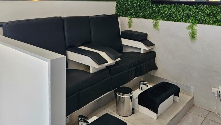 Elegant pedicure station at Life Lux Salon, Centurion, Gauteng, ZA, with plush seating and serene ambiance.