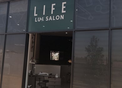 Front view of Life Lux Salon in Centurion, Gauteng, ZA, showcasing the stylish entrance and signage.
