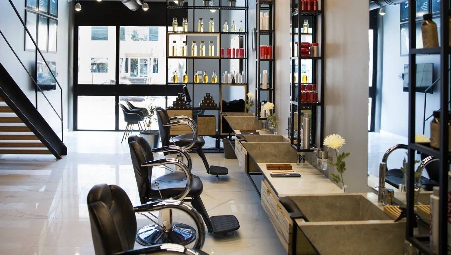 Stylish interior of Yousef Afandi-Shiekh Zayed in Giza Governorate, showcasing elegant salon equipment.
