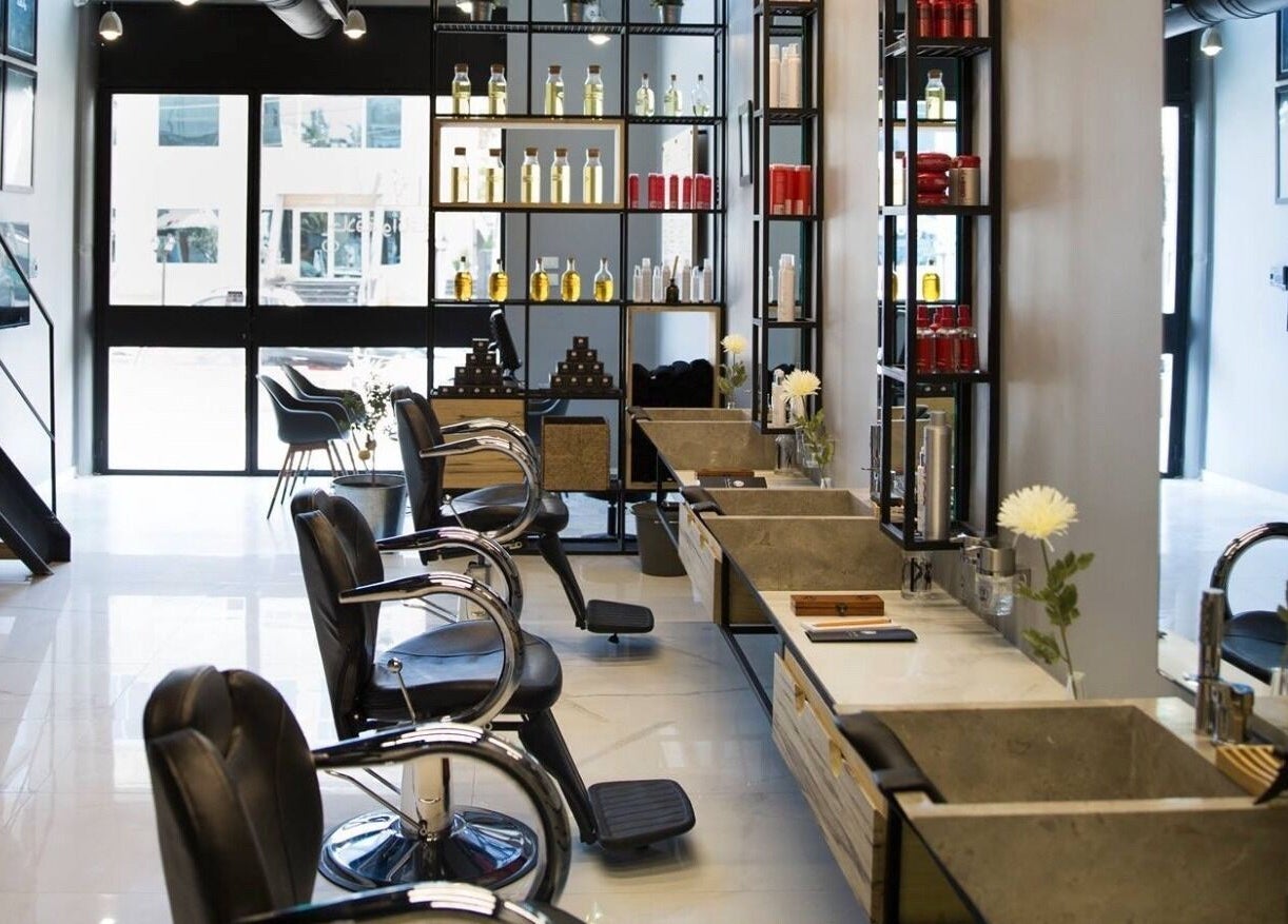 Stylish interior of Yousef Afandi-Shiekh Zayed in Giza Governorate, showcasing elegant salon equipment.