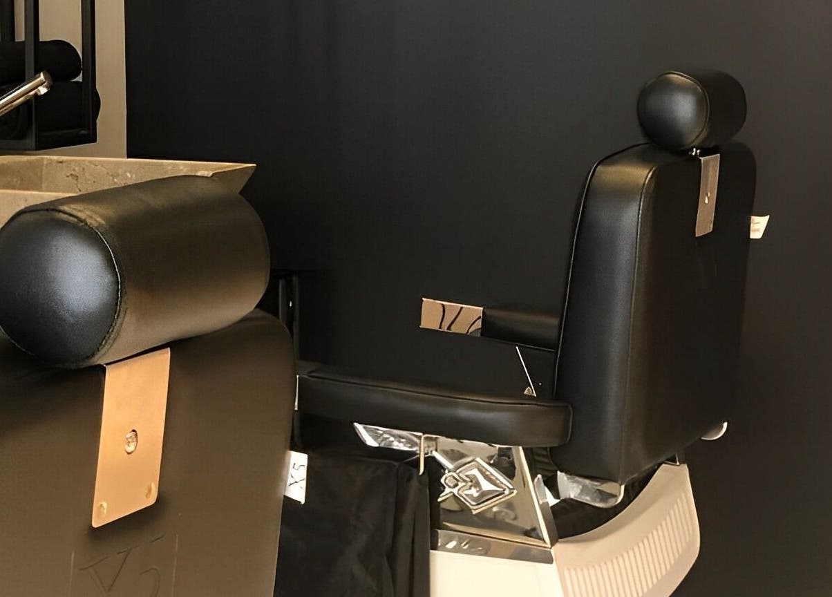 Stylish black salon chair at Yousef Afandi-Shiekh Zayed, Giza Governorate, Giza Governorate, EG.