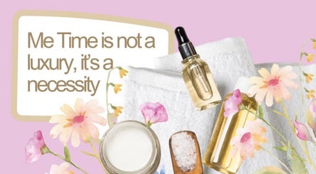 Beauty Within, Hull, England: Spa essentials with a 'Me Time' message, floral accents, oil bottles, towel, and salt.