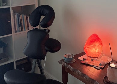 Massage room at Beauty Within, Hull, England, GB, with a salt lamp and massage chair for relaxation.