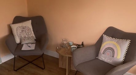 Relaxing seating area with pillows at Beauty Within, Hull, England, GB. Perfect for wellness retreats.