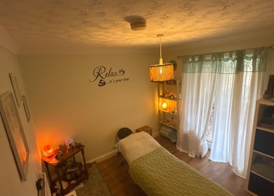 Relaxing room at Beauty Within, Hull, England, GB. Features massage table and warm lighting for serene ambiance.