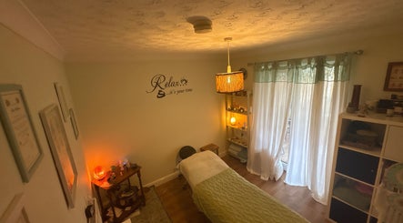 Relaxing room at Beauty Within, Hull, England, GB. Features massage table and warm lighting for serene ambiance.