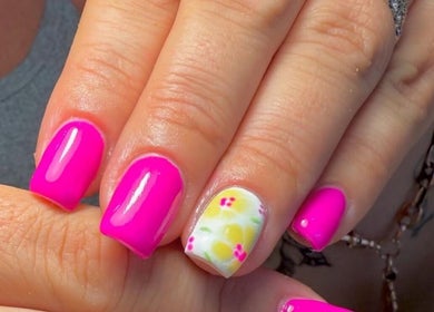 Bright pink and floral nails at Amore Nails & Beauty By Jayne in Birtley, England, GB.