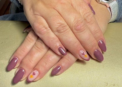 Elegant nail art at Amore Nails & Beauty By Jayne, Birtley, England, GB with purple polish and heart design.