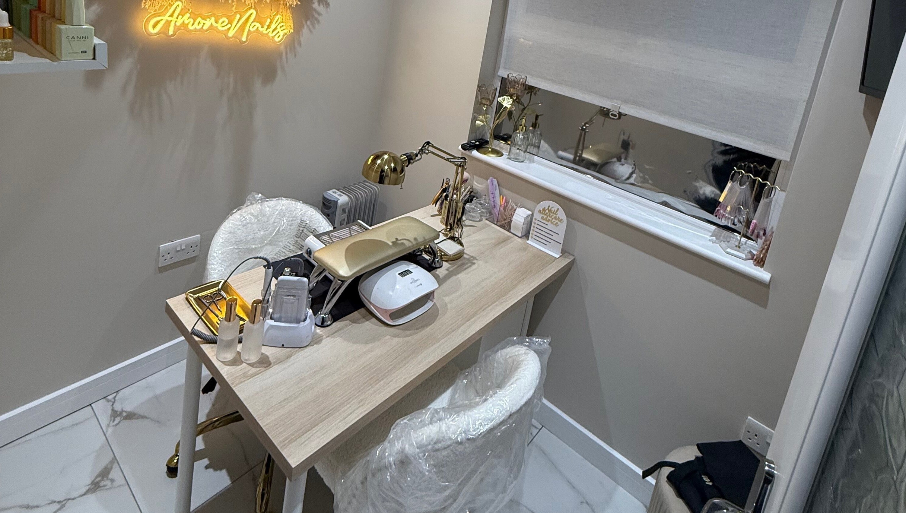 A chic nail station at Amore Nails & Beauty By Jayne in Birtley, England, GB, showcasing elegant decor.