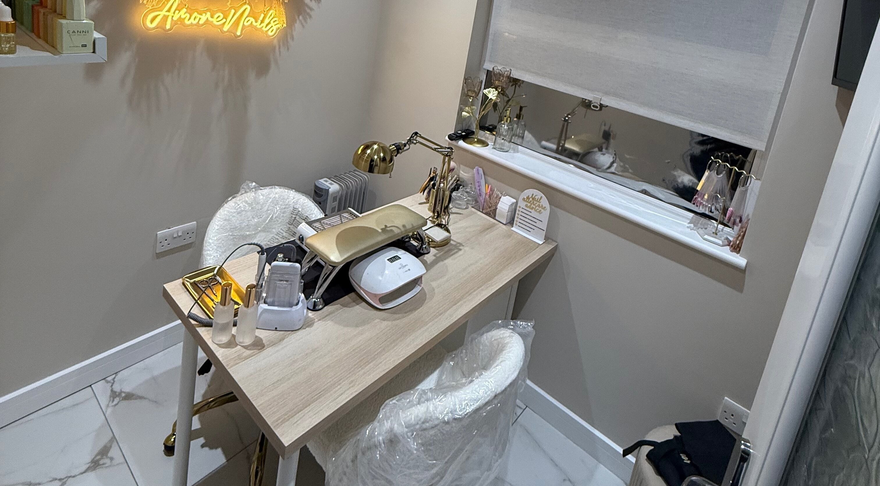 A chic nail station at Amore Nails & Beauty By Jayne in Birtley, England, GB, showcasing elegant decor.