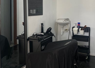 Modern salon interior at StudioGunteng, Cheras, Wilayah Persekutuan Kuala Lumpur, MY featuring elegant styling tools.