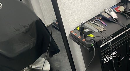 Styling tools neatly arranged at StudioGunteng, Cheras, Wilayah Persekutuan Kuala Lumpur, MY salon corner.