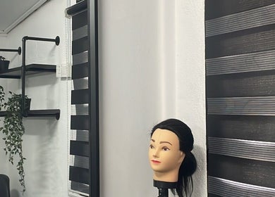 Stylish interior of StudioGunteng in Cheras, Kuala Lumpur, featuring a mannequin and modern decor.