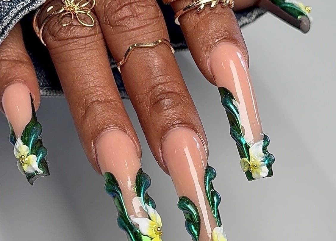 Elegant floral nail art design at Kayden Luong, Atlanta, Georgia, US showcasing intricate flower details.