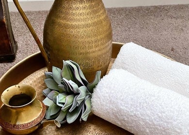 Brass jug and towels at Kundalini Temple in Kellyville, New South Wales, AU for peaceful relaxation.