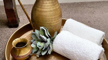 Brass jug and towels at Kundalini Temple in Kellyville, New South Wales, AU for peaceful relaxation.