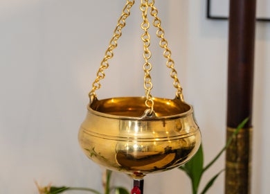 Golden ceremonial bowl at Kundalini Temple, Kellyville, New South Wales, AU reflecting serene ambiance.