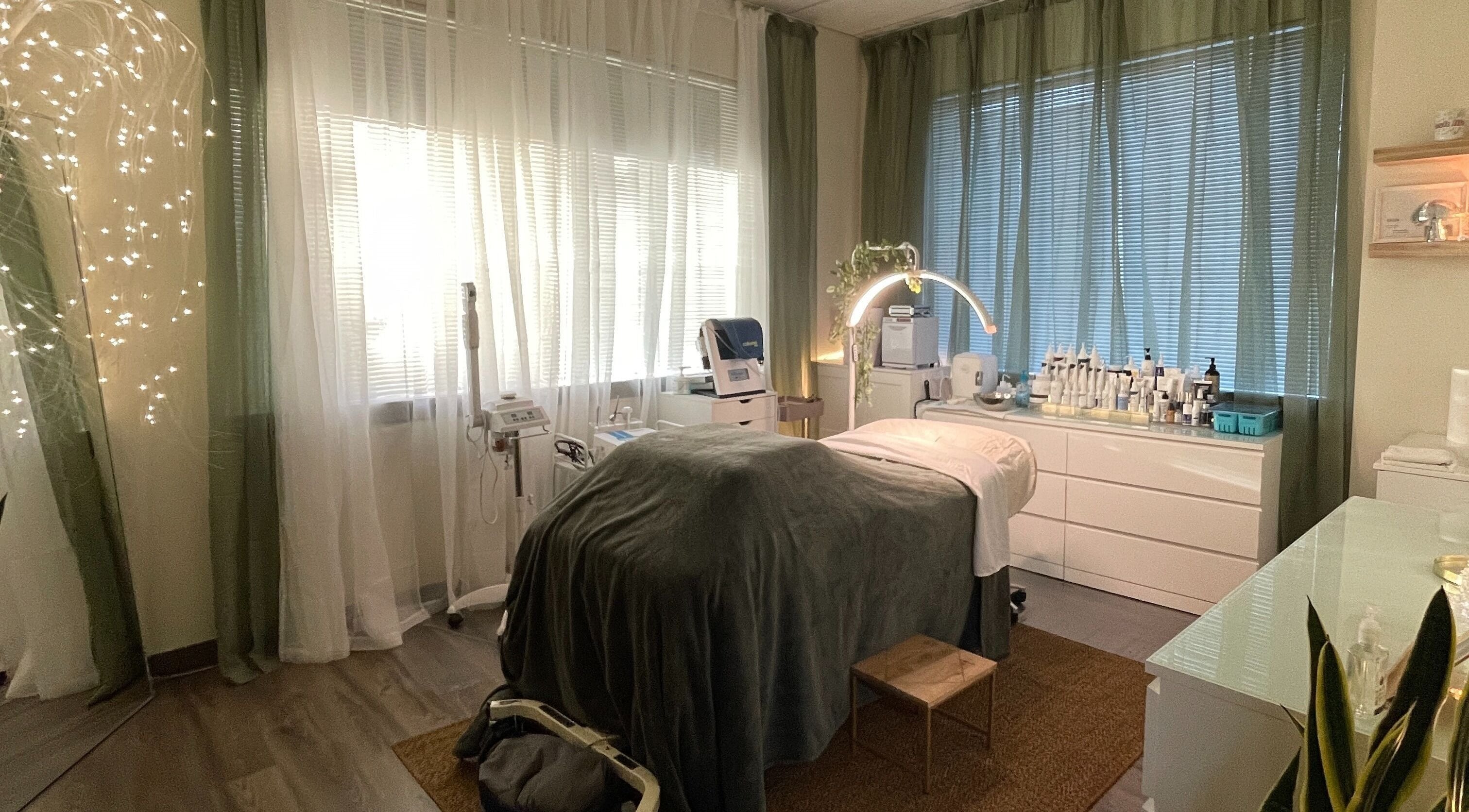 Relaxing spa treatment room at After Glo Beauty Collective in San Mateo, California, US.