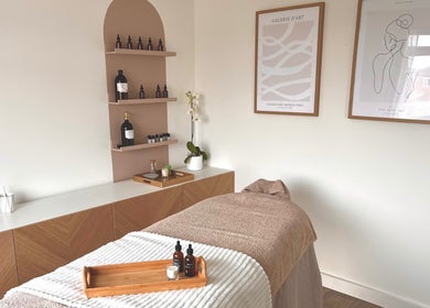 Cozy treatment room at AR Massage Therapy, Leeds, England, GB, featuring a massage table and calming decor.