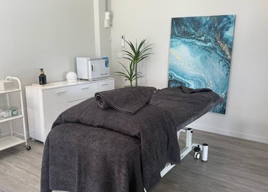 Serene massage room at Massage Relax Restore Townsville in Garbutt, Queensland, AU with calming decor.