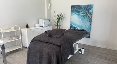 Serene massage room at Massage Relax Restore Townsville in Garbutt, Queensland, AU with calming decor.