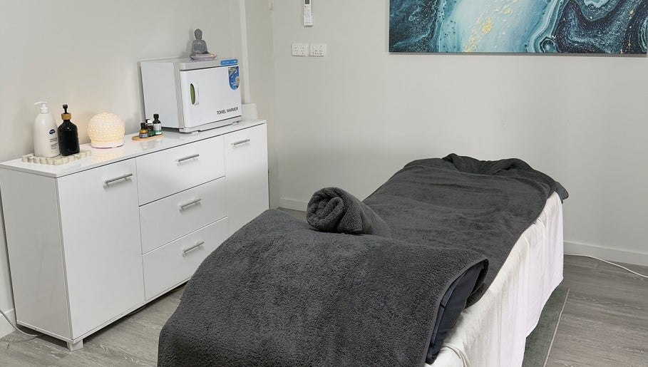 Tranquil massage room at Massage Relax Restore Townsville, Garbutt, Queensland, AU with cozy linens and ambient decor.