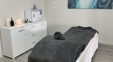 Tranquil massage room at Massage Relax Restore Townsville, Garbutt, Queensland, AU with cozy linens and ambient decor.