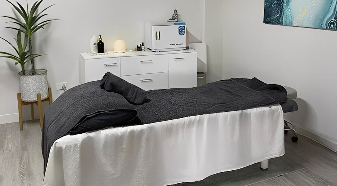 Cozy massage room at Massage Relax Restore Townsville, Garbutt, Queensland, AU with a calming ambiance.