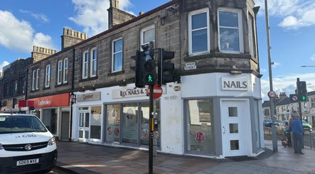 Street view of Lux Nails & Spa Carluke, located on High Street, Carluke, Scotland, GB.