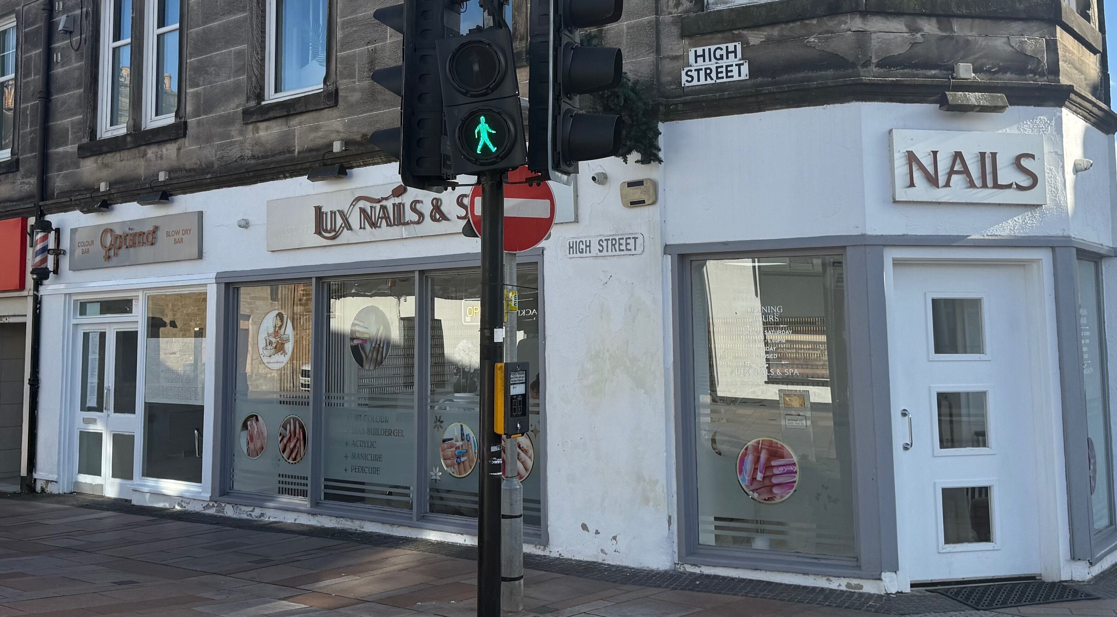 Exterior view of Lux Nails & Spa Carluke on High Street, Carluke, Scotland, GB with inviting signage.