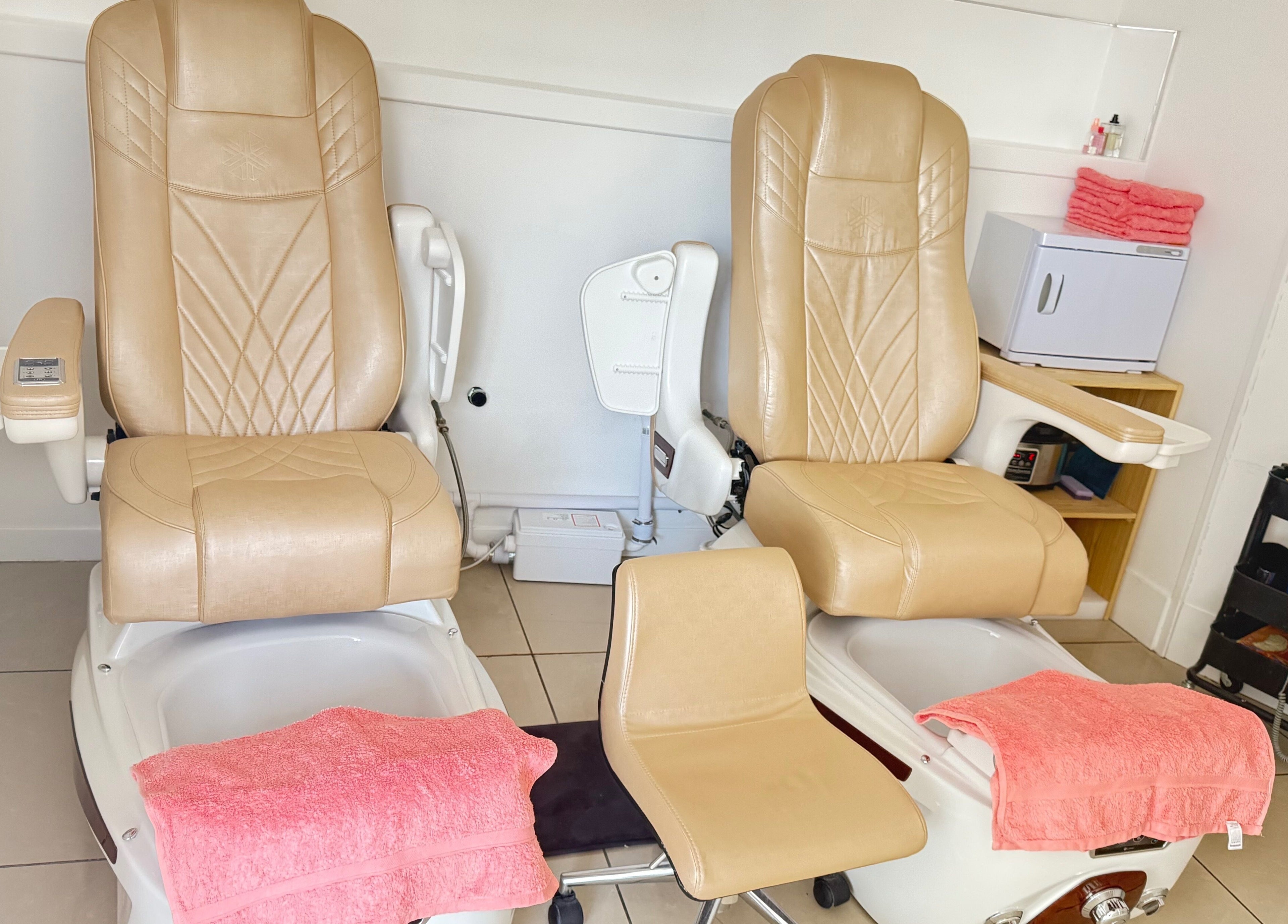 Luxurious pedicure chairs at Lux Nails & Spa Carluke, Carluke, Scotland, GB, ready for pampering guests.