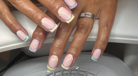 Chic pastel nail art with silver accents at Keexbeauty, Newport, Wales, GB, showcasing elegant manicure design.