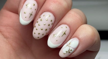 Elegant gold-accented nail art at Keexbeauty, Newport, Wales, GB showcasing luxury designs.