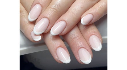Beautiful French manicure at Keexbeauty, Newport, Wales, GB, showcasing classic elegance and precision.