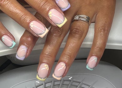 Pastel nail art with silver accents at Keexbeauty, Newport, Wales, GB.