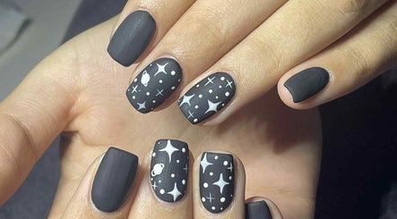 Stylish cosmic-themed nails at Leaf of Faith Beauty, Benoni, Gauteng, ZA showcasing unique design.