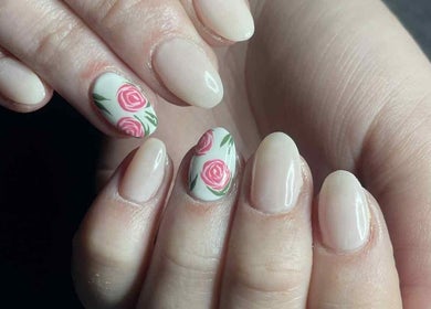 Elegant floral nail art with pink roses at Leaf of Faith Beauty, Benoni, Gauteng, ZA.