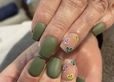 Green and heart nail art at Leaf of Faith Beauty, Benoni, Gauteng, ZA. Perfect for a stylish manicure.