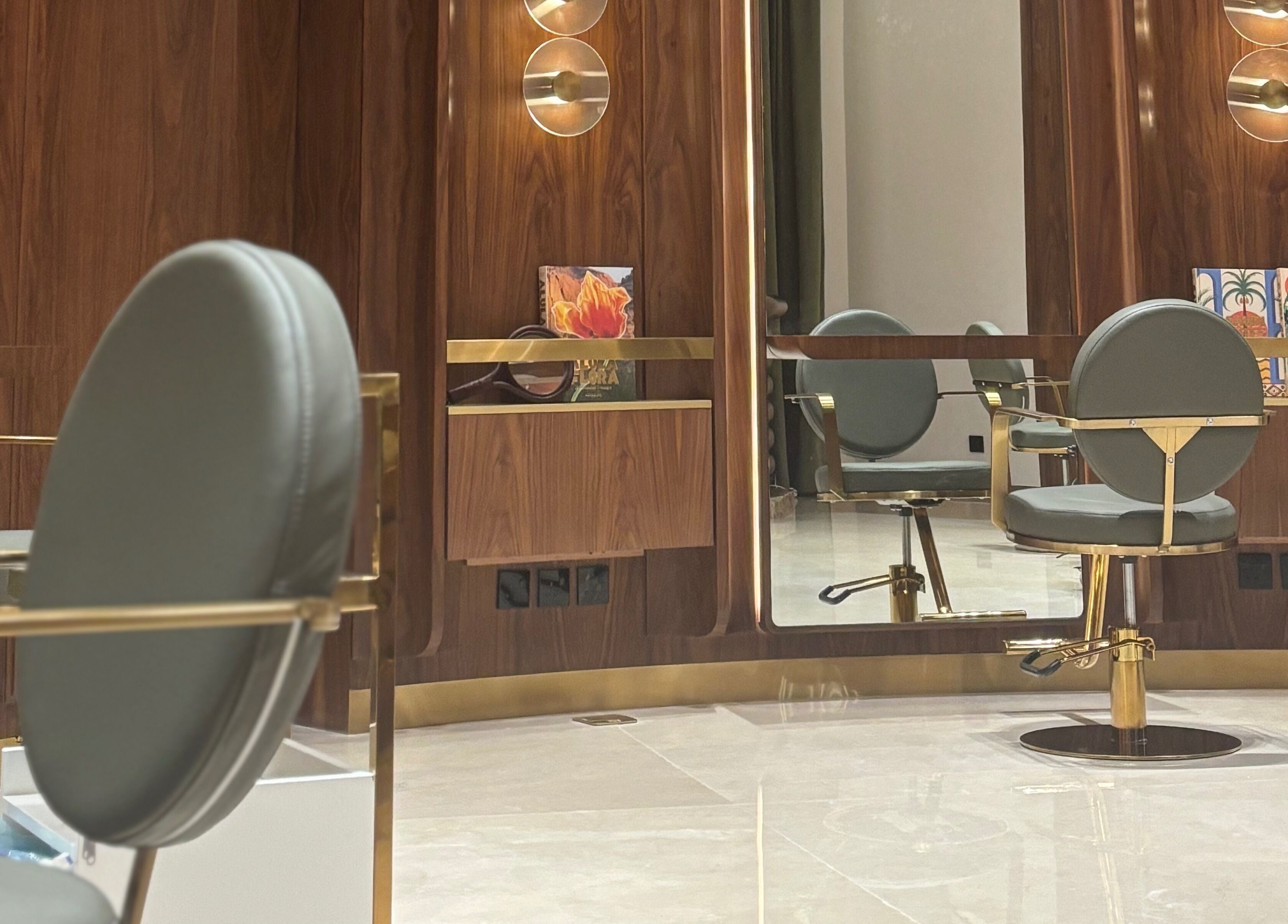 Stylish salon chairs in a luxurious setting at The Outré, Riyadh, Riyadh Province, SA.