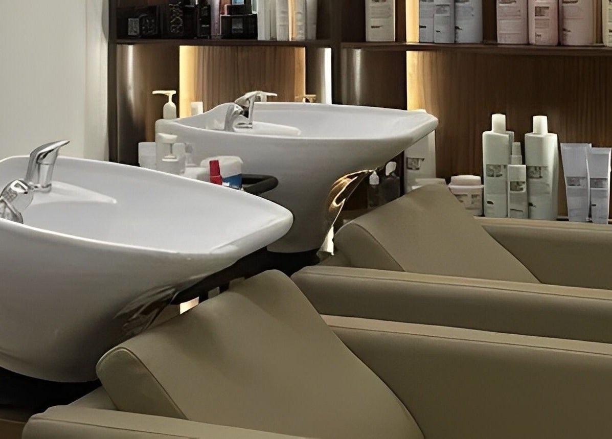 Luxurious salon wash station at The Outré, Riyadh, Riyadh Province, SA featuring high-end hair care.