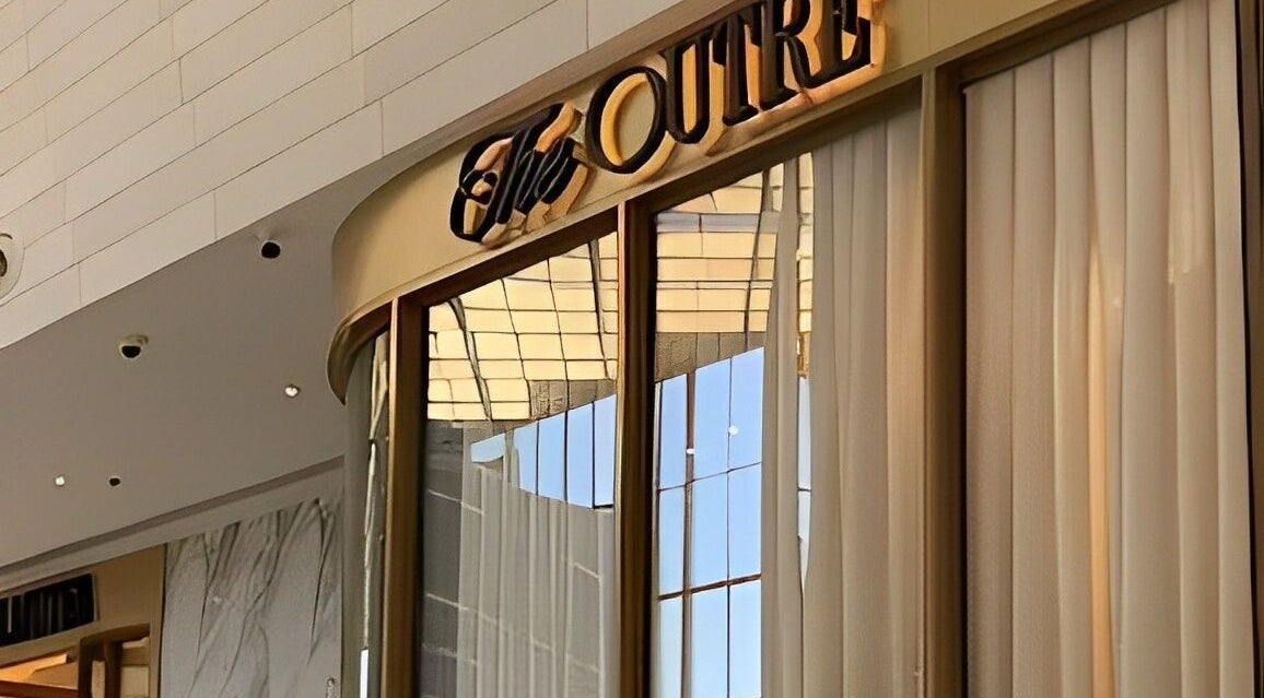 Entrance to The Outré, a premier beauty venue in Riyadh, Riyadh Province, SA, showcasing sophisticated design.